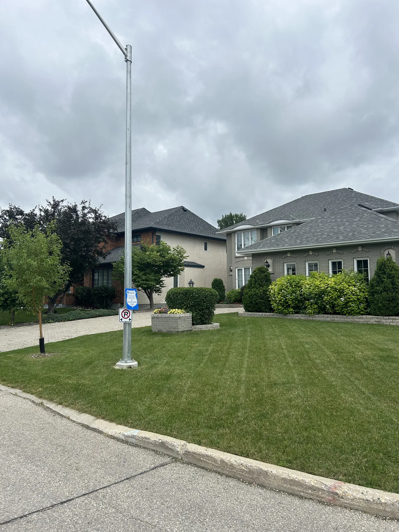 Freshly mowed residential front lawn in Winnipeg