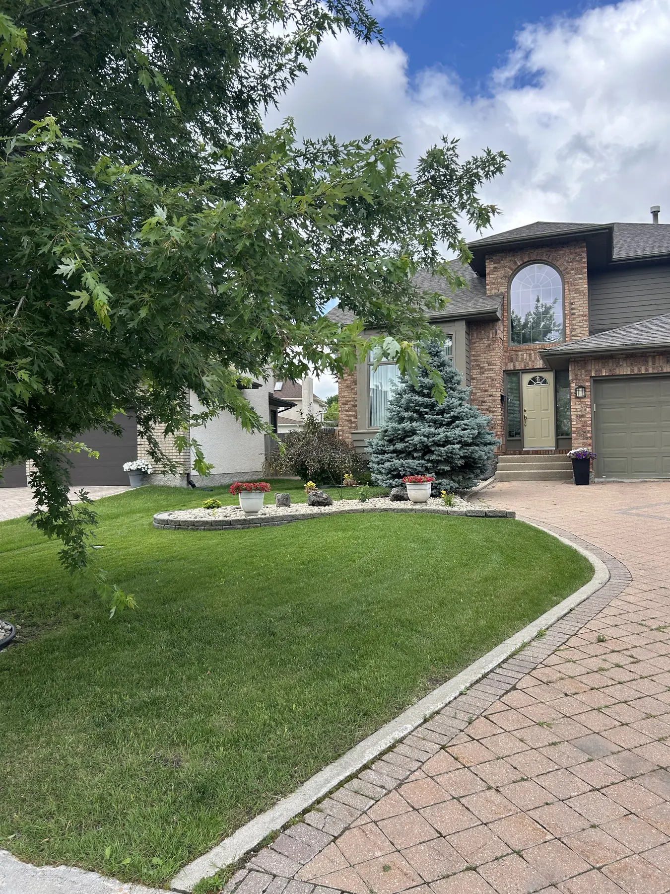 Freshly cut residential front lawn after the first mow of the season
