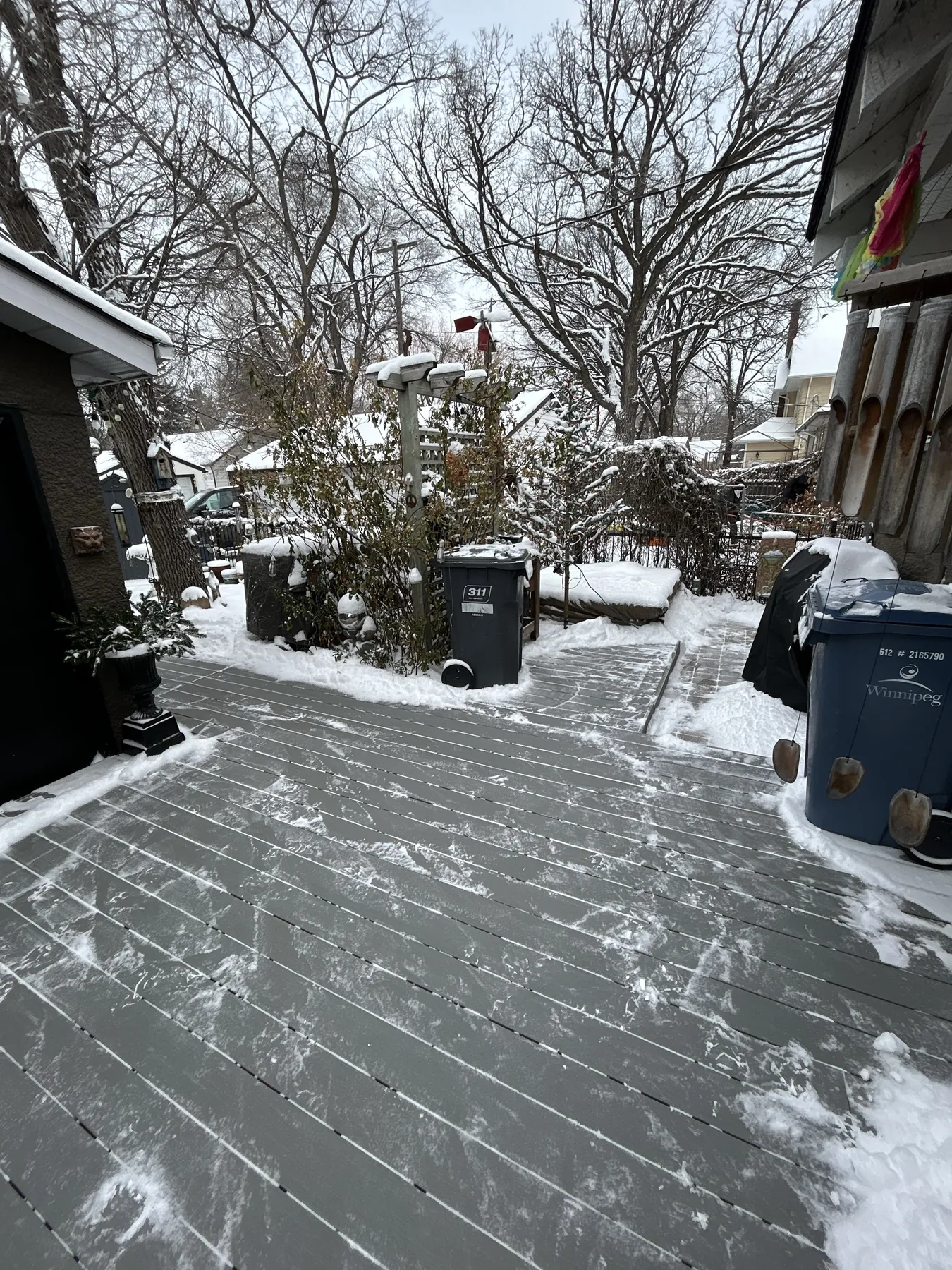 Long residential side driveway cleared to the pavement