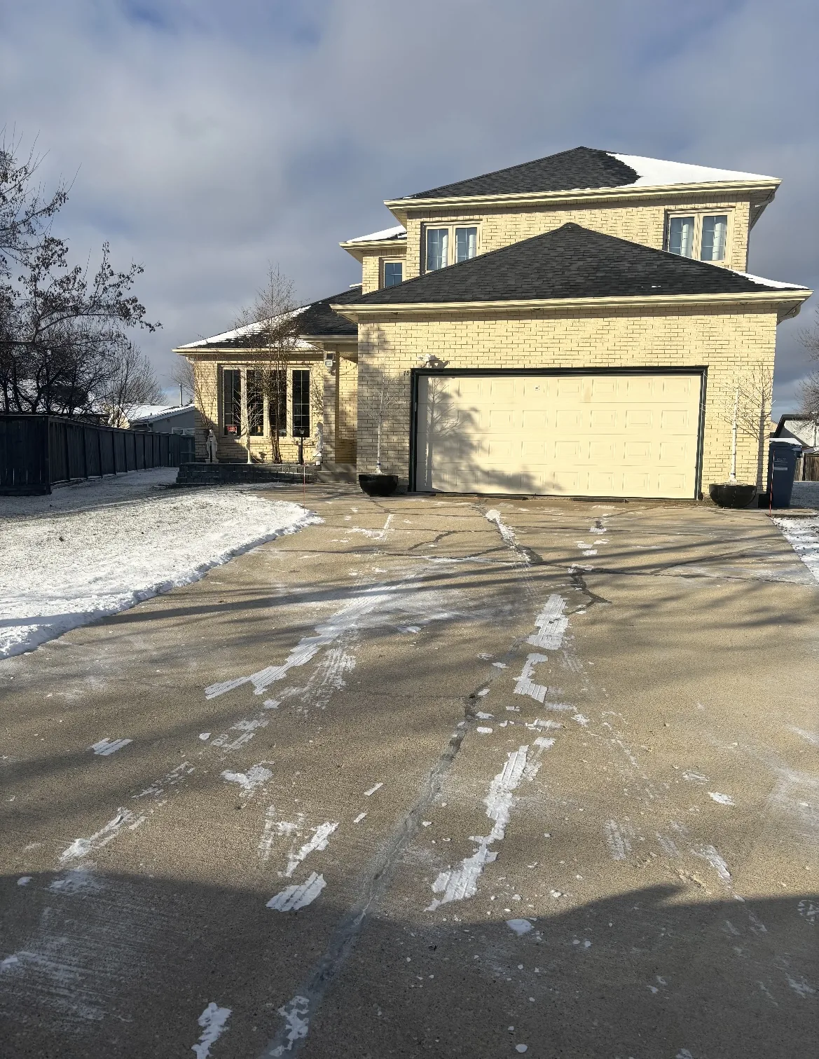 Large residential driveway cleared after winter snowfall
