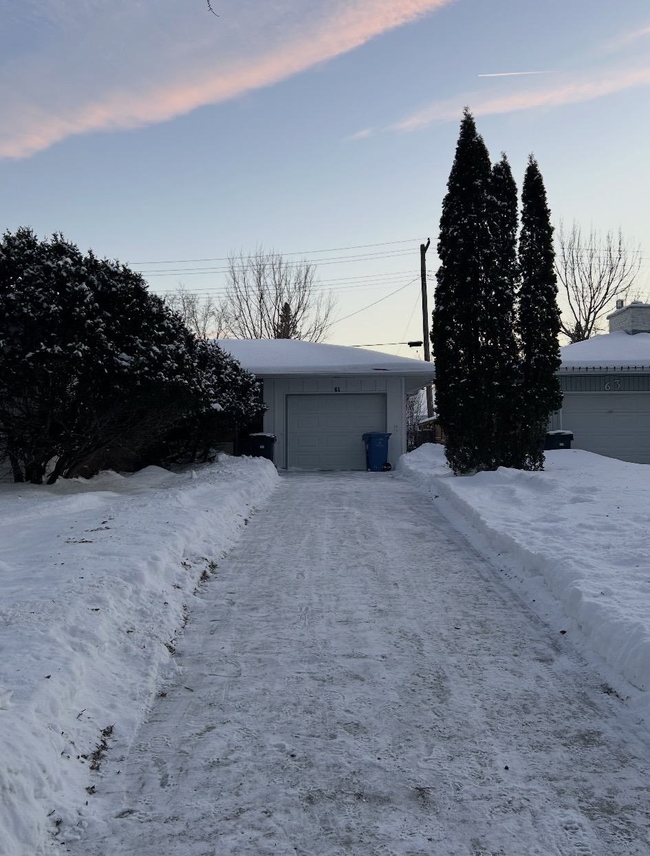 The same residential driveway cleared after Keystone snow removal service